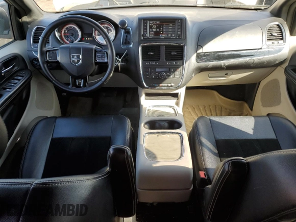 2016 Dodge Grand Caravan SXT with VIN 2C4RDGCG5GR219517, listed as a Copart auction lot 50052405 with 104,552 mi miles and Salvage Title. Bid and sale history available at DreamBid. Image 8.