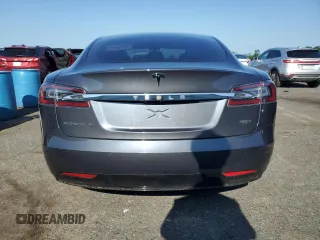 2017 Tesla Model S 100D с VIN 5YJSA1E2XHF185516, выставлен на аукционе Copart как лот 61816135 с пробегом 132 267 миль миль и Списание • Salvage title. История ставок и продаж доступна на DreamBid. Изображение 6.
