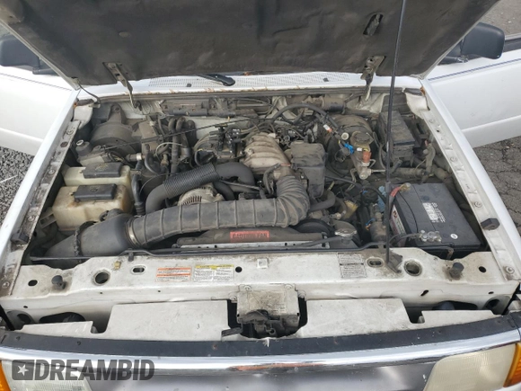 1996 Ford Ranger XL z VIN 1FTCR10U9TUB30318, wystawiony jako Copart lot #78193214 z przebiegiem 118 752 mil mil oraz Szkoda całkowita • Salvage title. Historia ofert i sprzedaży dostępna na DreamBid. Obrazek 12.