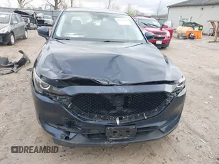 2017 Mazda CX-5 Touring with VIN JM3KFBCL7H0120552, listed as a IAAI auction lot 41953685 with 88,416 mi miles. Bid and sale history available at carsss.com. Image 6.