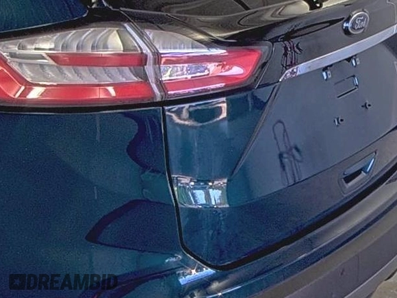 2020 Ford Edge Titanium z VIN 2FMPK3K91LBB37761, wystawiony jako IAAI lot #42829390 z przebiegiem 90 117 mil mil oraz . Historia ofert i sprzedaży dostępna na DreamBid. Obrazek 5.