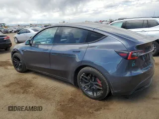 2021 Tesla Model Y Performance with VIN 5YJYGDEF0MF137692, listed as a Copart auction lot 55333395 with 56,325 mi miles and Salvage Title. Bid and sale history available at DreamBid. Image 2.