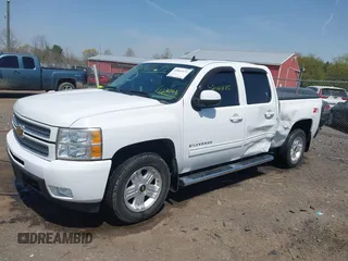2013 Chevrolet Silverado 1500 LTZ with VIN 3GCPKTE24DG123063, listed as a IAAI auction lot 42061675 with 221,813 mi miles and . Bid and sale history available at DreamBid. Image 2.