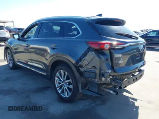 2017 Mazda CX-9 Signature with VIN JM3TCBEY6H0129927, listed as a IAAI auction lot 41739530 with 67,913 mi miles and . Bid and sale history available at DreamBid. Image 3.