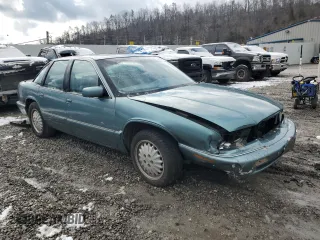 1995 Buick Regal Custom with VIN 2G4WB52L3S1459051, listed as a Copart auction lot 85779714 with 109,033 mi miles and Salvage title. Bid and sale history available at DreamBid. Image 4.