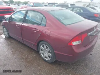 2010 Honda Civic Sdn LX with VIN 19XFA1F59AE062683, listed as a IAAI auction lot 41841984 with 154,936 mi miles. Bid and sale history available at carsss.com. Image 3.