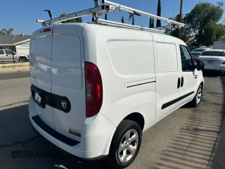 2022 Ram ProMaster City Cargo Tradesman with VIN ZFBHRFAB8N6W22817, listed as a Copart auction lot 66117855 with 34,878 mi miles and Salvage title. Bid and sale history available at DreamBid. Image 4.