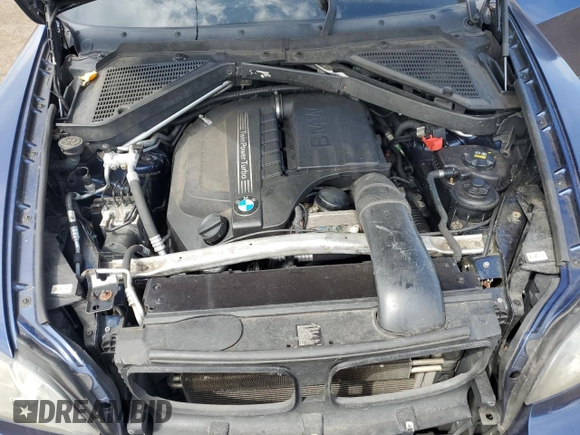 2012 BMW X5 35i with VIN 5UXZV4C56CL754643, listed as a Copart auction lot 55970125 with 150,584 mi miles and Salvage title. Bid and sale history available at DreamBid. Image 11.