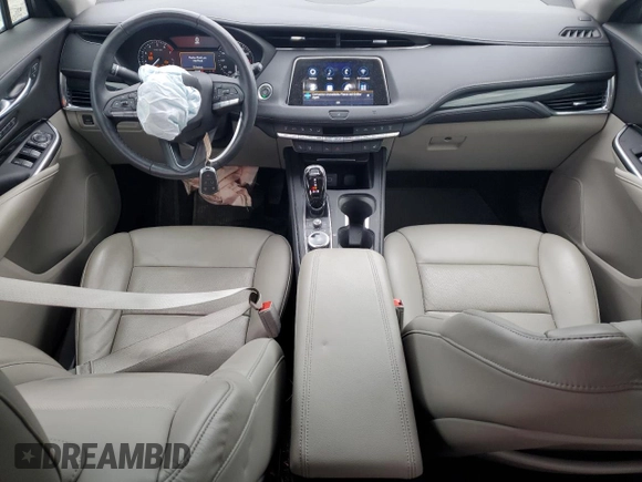 2021 Cadillac XT4 FWD Premium Luxury with VIN 1GYFZCR43MF032297, listed as a Copart auction lot 47379085 with 36,065 mi miles and Salvage Title. Bid and sale history available at DreamBid. Image 8.