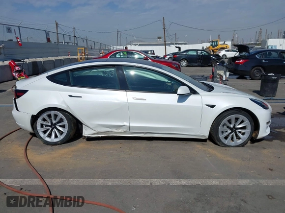 2023 Tesla Model 3 with VIN 5YJ3E1EA9PF640015, listed as a IAAI auction lot 41622086 with 15,622 mi miles and . Bid and sale history available at carsss.com. Image 13.