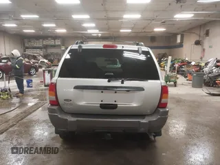 2004 Jeep Grand Cherokee Laredo with VIN 1J4GW48S44C321869, listed as a IAAI auction lot 41822099 with 181,663 mi miles. Bid and sale history available at carsss.com. Image 16.
