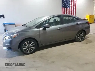 2021 Nissan Versa SV z VIN 3N1CN8EV0ML870621, wystawiony jako Copart lot #54606355 z przebiegiem 80 702 mil mil oraz Czysty tytuł • Clean title. Historia ofert i sprzedaży dostępna na DreamBid. Obrazek 1.