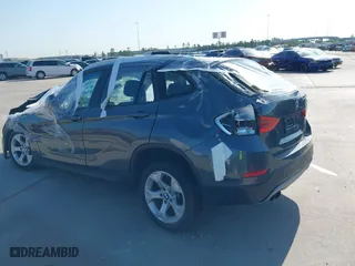 2014 BMW X1 sDrive28i with VIN WBAVM1C53EVW48026, listed as a IAAI auction lot 41714732 with 1 mi miles. Bid and sale history available at carsss.com. Image 3.