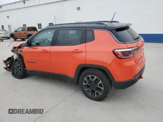2019 Jeep Compass Trailhawk with VIN 3C4NJDDB5KT597819, listed as a Copart auction lot 51287675 with 126,454 mi miles and Salvage Title. Bid and sale history available at carsss.com. Image 2.