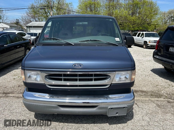 1998 Ford Econoline Passenger XL with VIN 1FMRE11L6WHB65841, listed as a IAAI auction lot 42123953 with 63,138 mi miles. Bid and sale history available at carsss.com. Image 6.