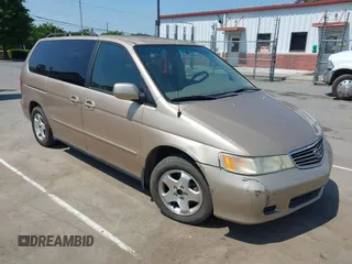 2000 Honda Odyssey EX with VIN 2HKRL1868YH001859, listed as a IAAI auction lot 42165724 with 209,393 mi miles and . Bid and sale history available at DreamBid. Image 1.
