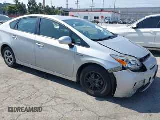 2015 Toyota Prius Four z VIN JTDKN3DU0F0443718, wystawiony jako IAAI lot #42466300 z przebiegiem 110 826 mil mil oraz . Historia ofert i sprzedaży dostępna na DreamBid. Obrazek 1.
