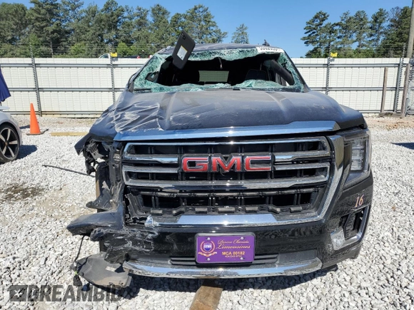 2023 GMC Yukon XL SLT with VIN 1GKS2GKDXPR254627, listed as a Copart auction lot 59226594 with 39,428 mi miles and Salvage Title. Bid and sale history available at DreamBid. Image 5.