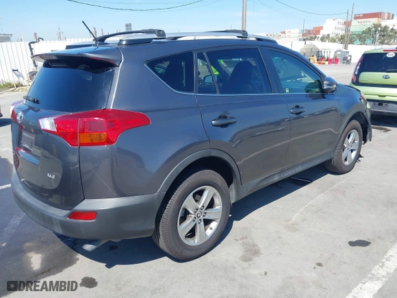 2015 Toyota RAV4 XLE with VIN JTMWFREV2FJ053898, listed as a IAAI auction lot 41997055 with 143,551 mi miles. Bid and sale history available at carsss.com. Image 4.