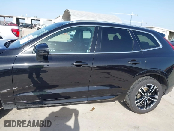 2020 Volvo XC60 Momentum z VIN YV4102RK9L1474206, wystawiony jako IAAI lot #41731881 z przebiegiem 77 908 mil mil oraz . Historia ofert i sprzedaży dostępna na DreamBid. Obrazek 14.