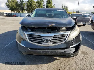2012 Kia Sportage LX с VIN KNDPB3A21C7345995, выставлен на аукционе Copart как лот 51629505 с пробегом 129 255 миль миль и Списание • Salvage title. История ставок и продаж доступна на DreamBid. Изображение 5.