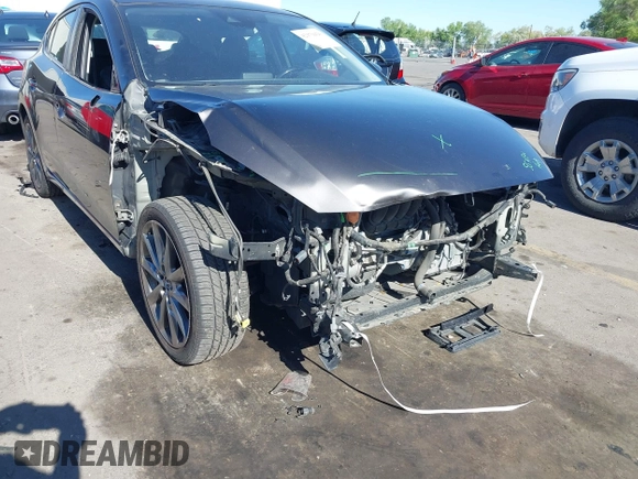 2018 Mazda 3 Touring with VIN 3MZBN1L34JM164952, listed as a IAAI auction lot 42179420 with 106,706 mi miles and . Bid and sale history available at DreamBid. Image 6.