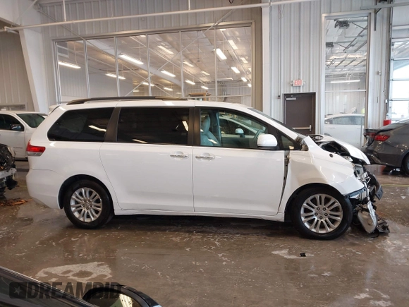 2014 Toyota Sienna XLE with VIN 5TDYK3DC5ES508021, listed as a IAAI auction lot 41963128 with 162,578 mi miles. Bid and sale history available at carsss.com. Image 14.