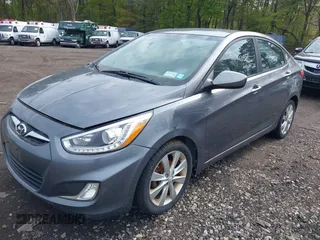 2014 Hyundai Accent GLS with VIN KMHCU4AE9EU761298, listed as a IAAI auction lot 42186032 with 118,848 mi miles and . Bid and sale history available at carsss.com. Image 6.
