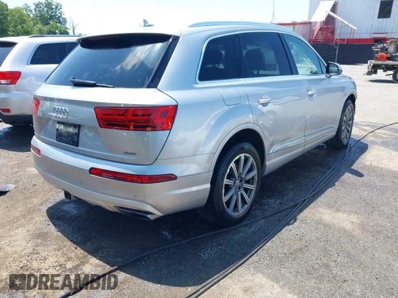 2018 Audi Q7 Premium Plus with VIN WA1LHAF74JD015170, listed as a IAAI auction lot 42542451 with 104,990 mi miles and . Bid and sale history available at DreamBid. Image 4.