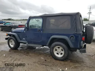 2005 Jeep Wrangler Unlimited with VIN 1J4FA44S95P335275, listed as a Copart auction lot 70788864 with 152,096 mi miles and Salvage Title. Bid and sale history available at carsss.com. Image 2.