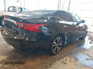 2017 Nissan Maxima SV with VIN 1N4AA6AP1HC364959, listed as a IAAI auction lot 41364246 with 148,486 mi miles and . Bid and sale history available at DreamBid. Image 4.