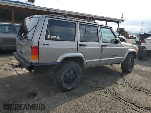 2000 Jeep Cherokee with VIN 1J4FF48S5YL172583, listed as a Copart auction lot 59605745 with 258,409 mi miles and Salvage title. Bid and sale history available at DreamBid. Image 3.