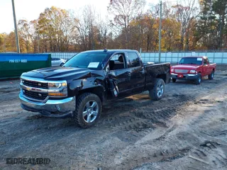 2018 Chevrolet Silverado 1500 LT with VIN 1GCVKREC1JZ292441, listed as a IAAI auction lot 41074213 with 146,607 mi miles. Bid and sale history available at carsss.com. Image 2.