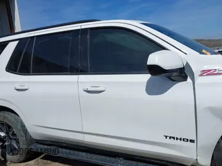 2021 Chevrolet Tahoe Z71 with VIN 1GNSKPKD7MR117286, listed as a IAAI auction lot 41778088 with 87,938 mi miles and . Bid and sale history available at DreamBid. Image 14.