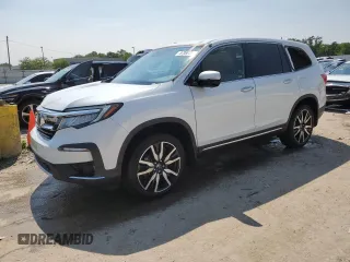 2022 Honda Pilot Elite with VIN 5FNYF6H08NB059590, listed as a Copart auction lot 57460235 with 67,593 mi miles and Salvage title. Bid and sale history available at DreamBid. Image 1.