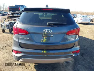 2017 Hyundai Santa Fe 2.4L with VIN 5XYZTDLB0HG453575, listed as a IAAI auction lot 41036334 with 114,031 mi miles and . Bid and sale history available at DreamBid. Image 16.