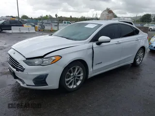 2019 Ford Fusion Hybrid SE with VIN 3FA6P0LU9KR206740, listed as a IAAI auction lot 41933661 with 143,111 mi miles. Bid and sale history available at carsss.com. Image 17.