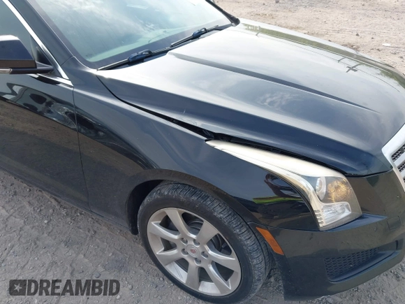 2014 Cadillac ATS Luxury AWD with VIN 1G6AH5RX2E0119821, listed as a IAAI auction lot 42670758 with 157,925 mi miles and . Bid and sale history available at DreamBid. Image 17.