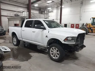 2018 Ram 2500 Laramie with VIN 3C6UR5FL1JG213467, listed as a IAAI auction lot 41513596 with 100,855 mi miles. Bid and sale history available at carsss.com. Image 1.