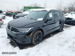 2024 Volkswagen Tiguan SE R-Line Black with VIN 3VV8B7AX6RM067036, listed as a IAAI auction lot 41539506 with 10,319 mi miles. Bid and sale history available at carsss.com. Image 2.