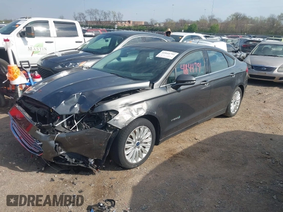 2016 Ford Fusion SE Hybrid with VIN 3FA6P0LU7GR218781, listed as a IAAI auction lot 41844791 with 214,867 mi miles. Bid and sale history available at carsss.com. Image 2.