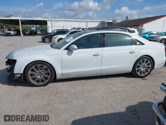 2015 Audi A8 L 4.0T with VIN WAU32AFD4FN002639, listed as a IAAI auction lot 41703951 with 103,722 mi miles. Bid and sale history available at carsss.com. Image 15.