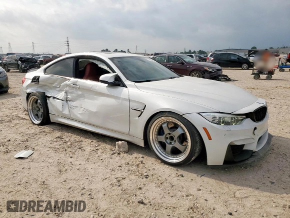 2015 BMW M4 with VIN WBS3R9C5XFK332533, listed as a Copart auction lot 57030615 with 97,739 mi miles and Salvage title. Bid and sale history available at DreamBid. Image 4.