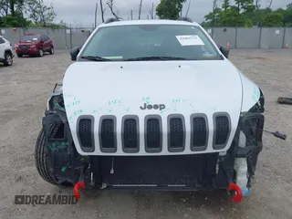 2014 Jeep Cherokee Trailhawk z VIN 1C4PJMBS4EW210719, wystawiony jako IAAI lot #42461733 z przebiegiem 134 096 mil mil oraz . Historia ofert i sprzedaży dostępna na DreamBid. Obrazek 12.