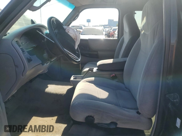 1998 Ford Ranger XL with VIN 1FTZR15U9WPA86018, listed as a Copart auction lot 75245844 with 143,067 mi miles and Salvage Title. Bid and sale history available at DreamBid. Image 7.
