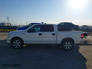 2007 Ford F-150 XLT with VIN 1FTPW12527FB74543, listed as a IAAI auction lot 41723554 with 217,242 mi miles. Bid and sale history available at carsss.com. Image 14.
