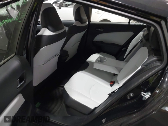 2022 Toyota Prius L Eco with VIN JTDKAMFU2N3186072, listed as a IAAI auction lot 42486252 with 5,887 mi miles and . Bid and sale history available at DreamBid. Image 8.
