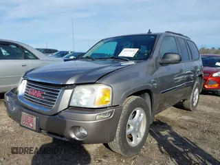 2007 GMC Envoy SLE with VIN 1GKDS13S372241844, listed as a IAAI auction lot 41575443 with 144,726 mi miles. Bid and sale history available at carsss.com. Image 2.