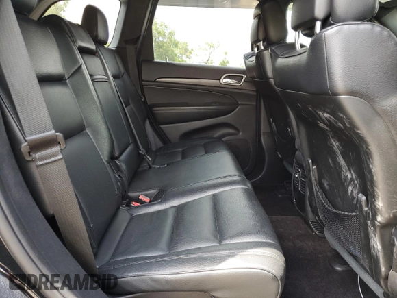 2018 Jeep Grand Cherokee Laredo E with VIN 1C4RJEAG1JC354221, listed as a Copart auction lot 58002715 with 108,223 mi miles and Salvage title. Bid and sale history available at DreamBid. Image 11.