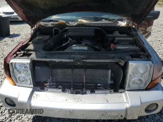 2007 Jeep Commander Sport with VIN 1J8HG48K07C684965, listed as a Copart auction lot 58061005 with 208,951 mi miles and Salvage title. Bid and sale history available at DreamBid. Image 12.